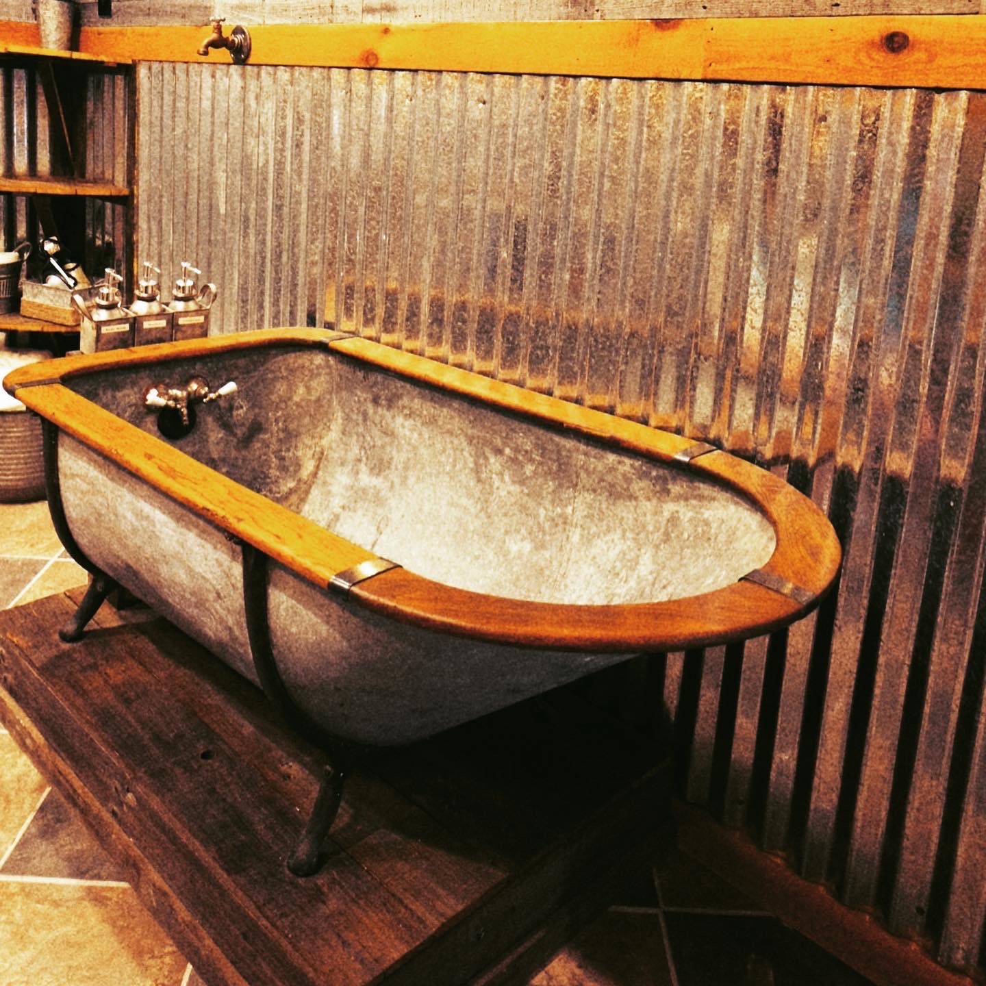 rustic tub in glowing embers room
